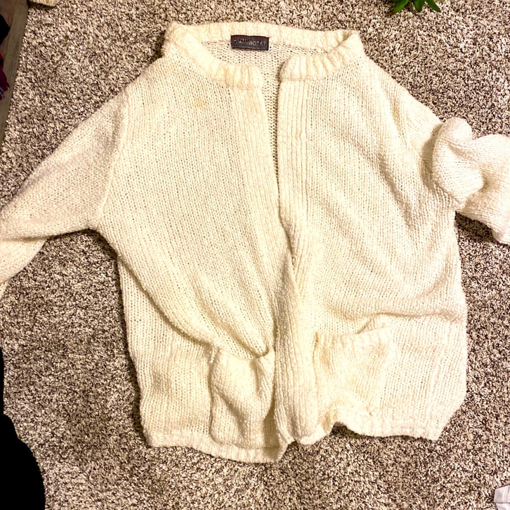 Selling white cardigan in a size large gently used and well loved